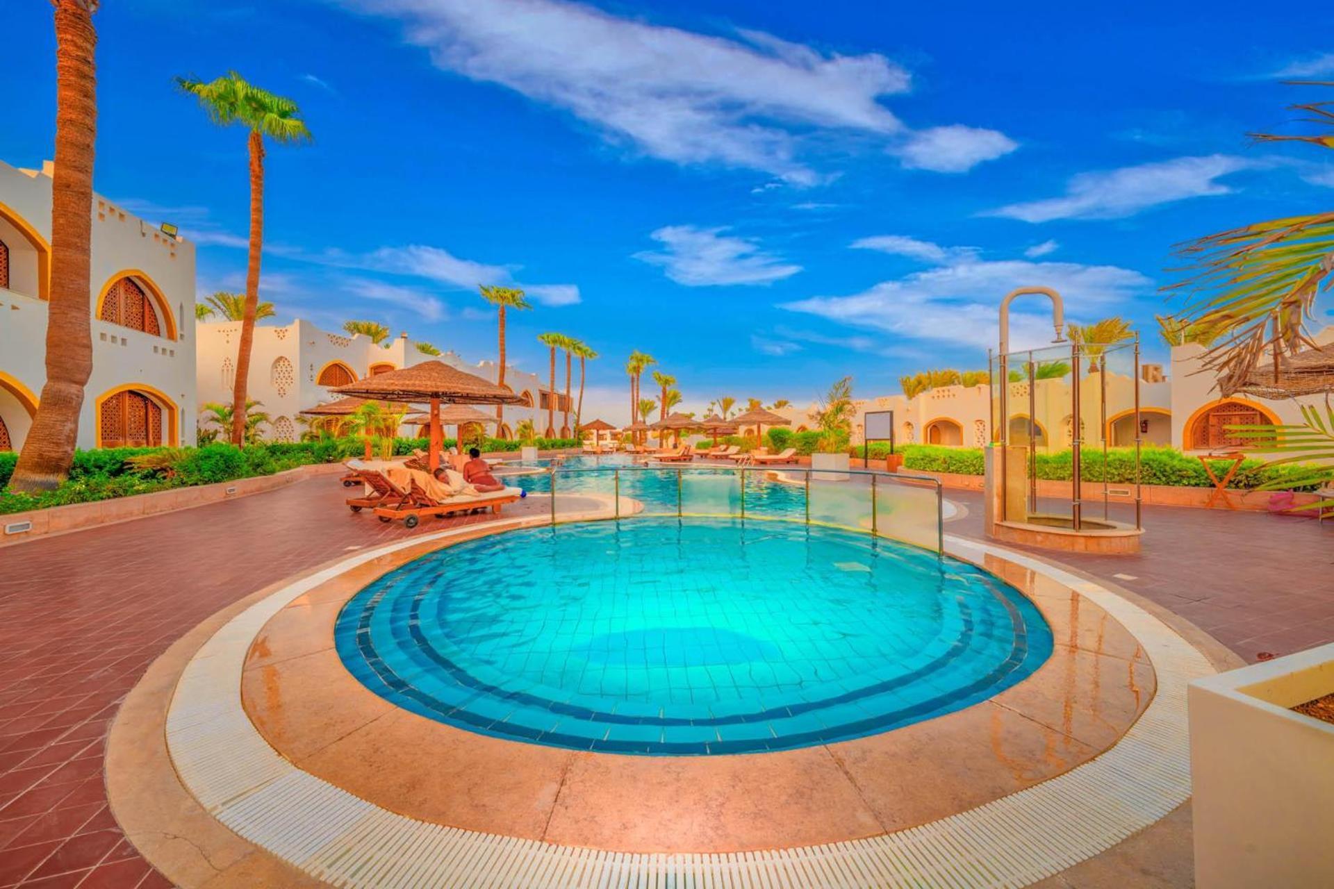 Domina coral bay resort&spa sharm el sheikh Exterior foto The swimming pool at the resort