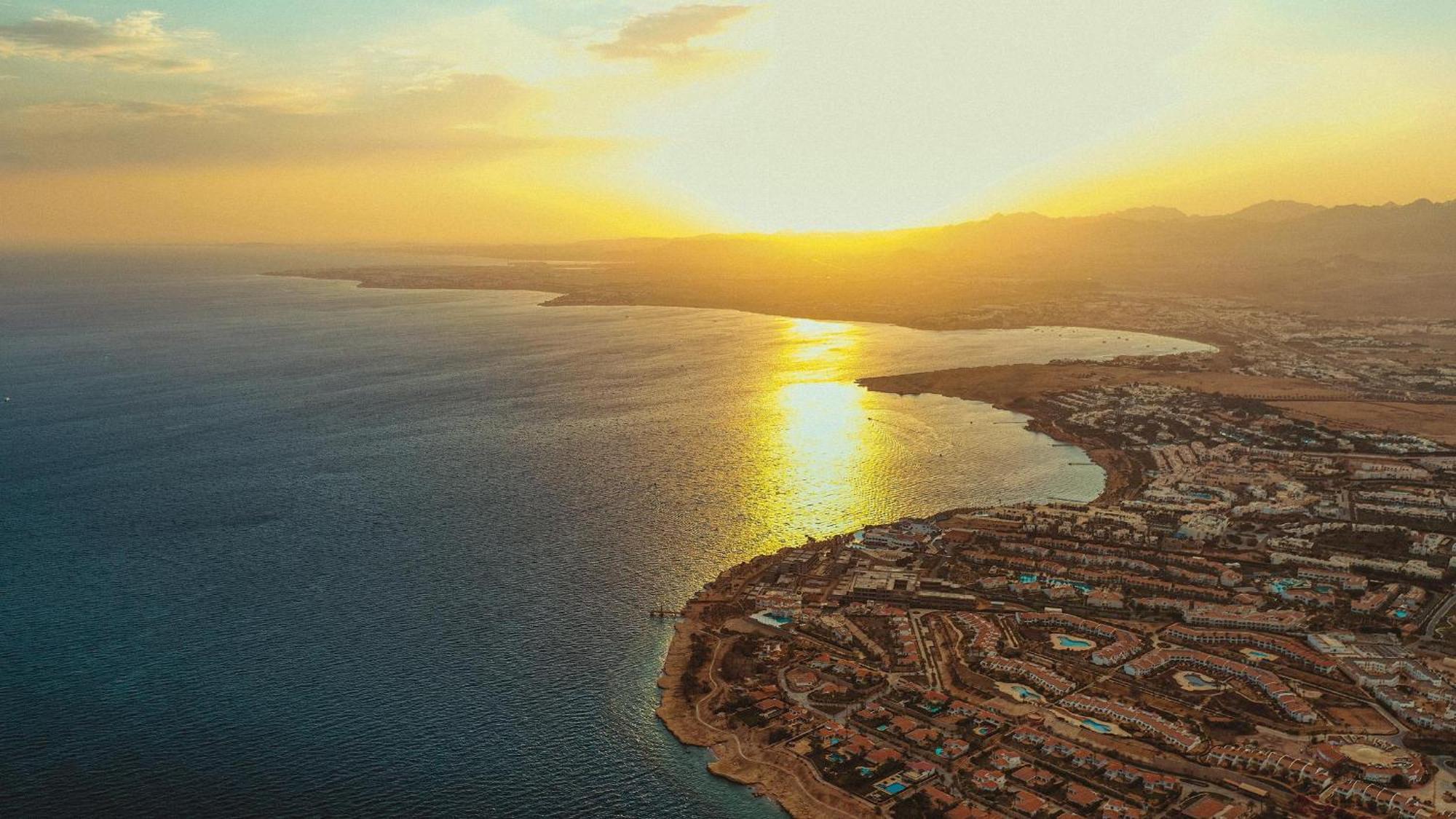 Domina coral bay resort&spa sharm el sheikh Exterior foto Sunset over the Dead Sea